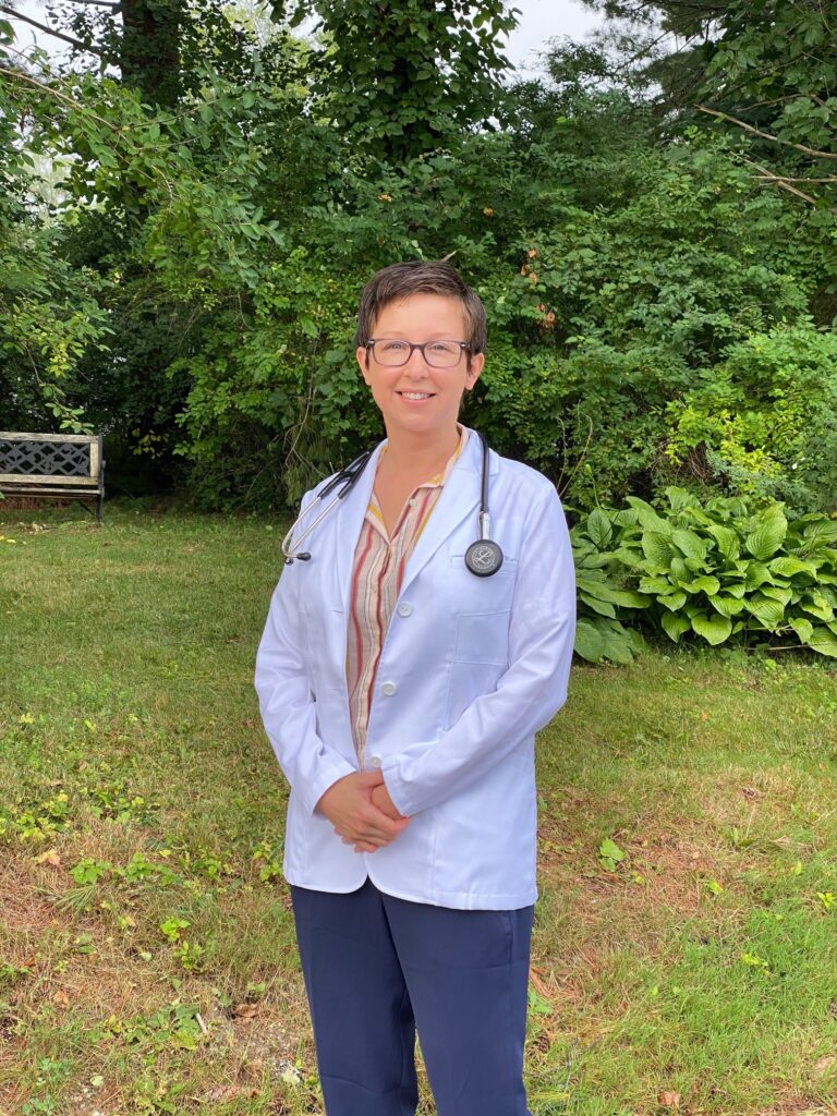 Photo of CHP's new family nurse practitioner standing in a garden